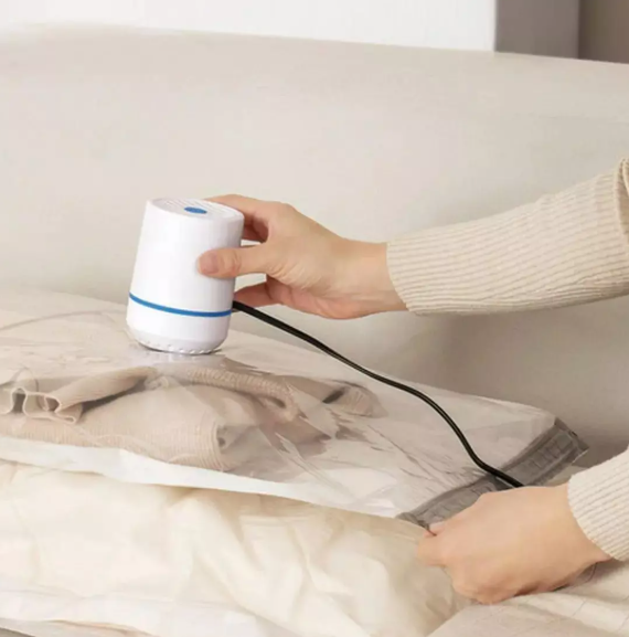 Bomba de vacío eléctrica sellando bolsa